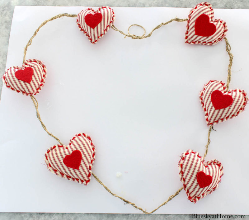 Valentine wreath with red fabric hearts