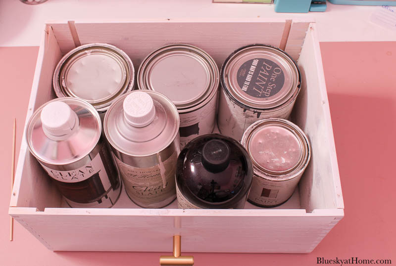 storage drawer with paint cans