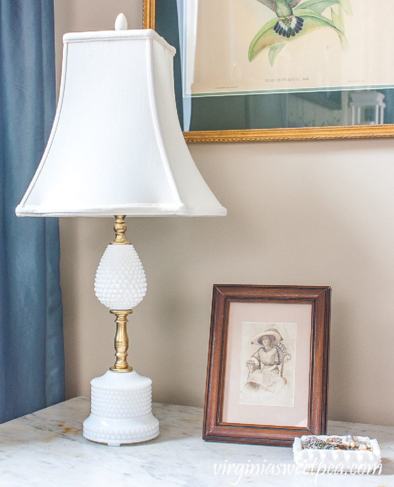 tall white lamp with gold accents