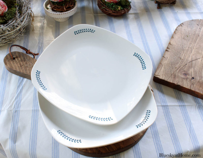 white dishes with blue designs