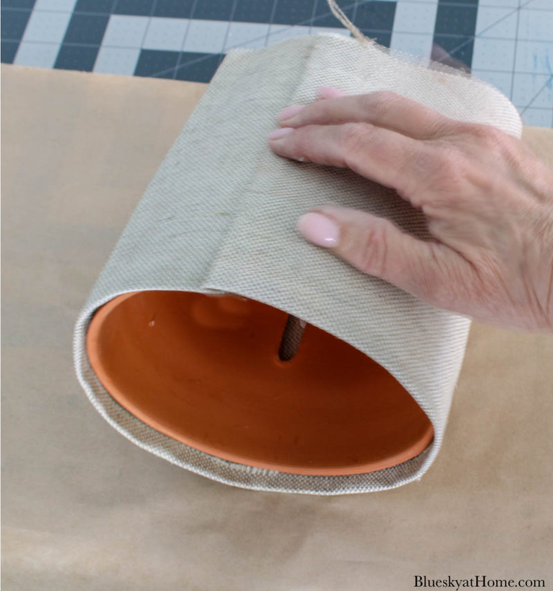 wrapping clay pot in fabric