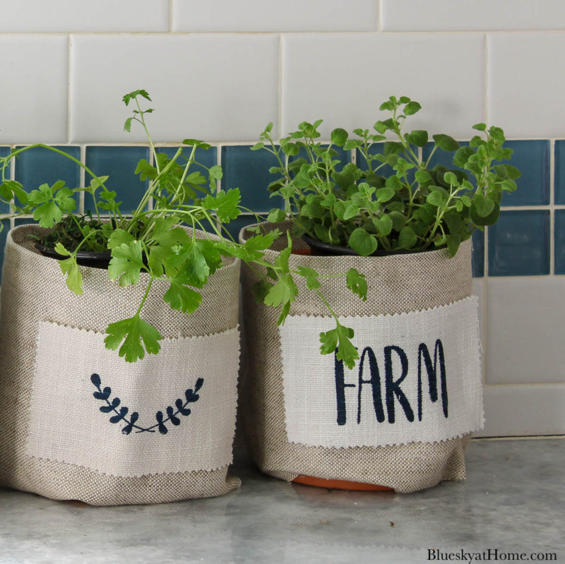 fabric-covered clay pots with stencil design