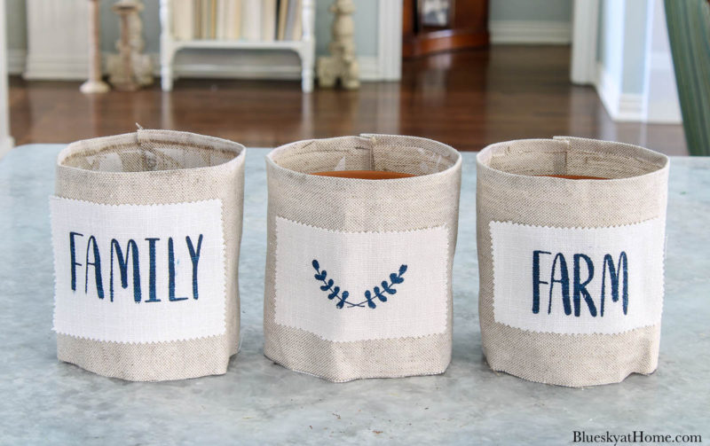 fabric-covered clay pots with stencil design