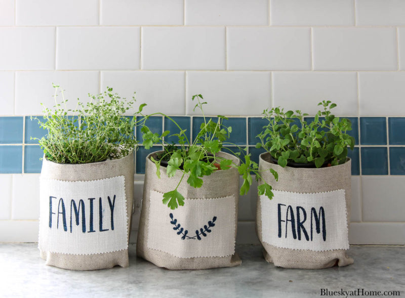 fabric-covered clay pots with stencil design