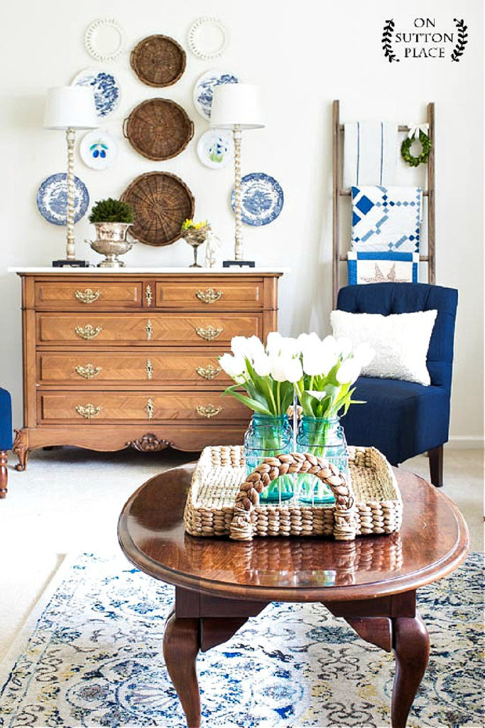 spring living room with blue chair and blue plates