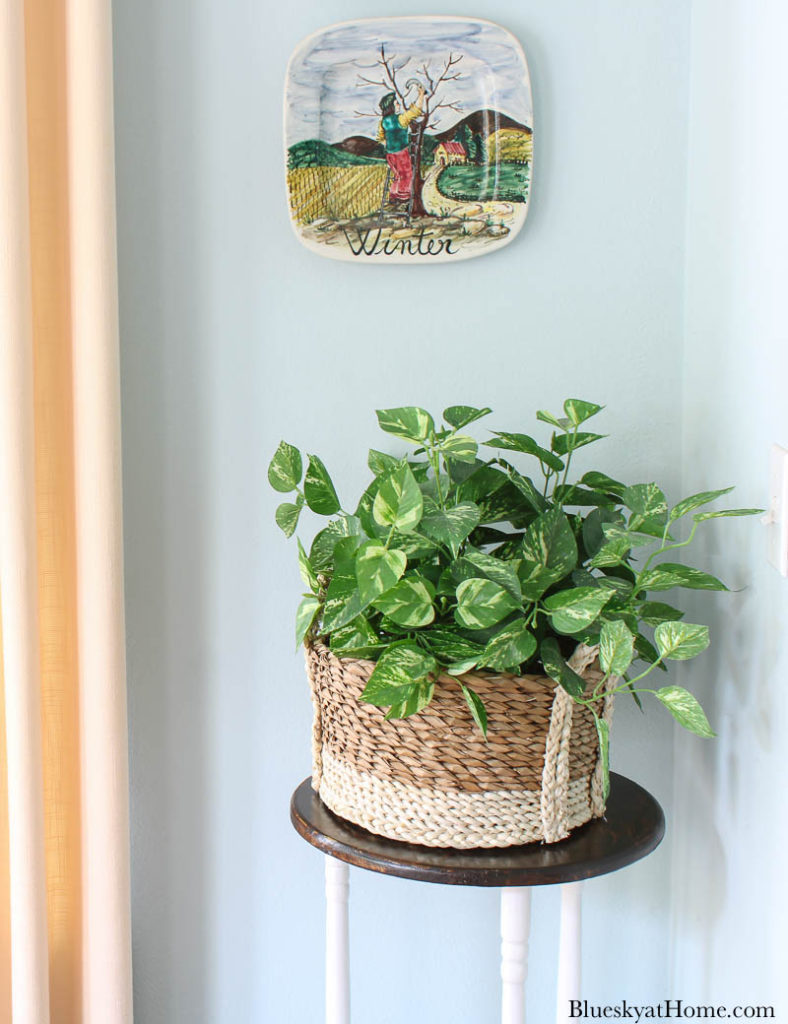 repurposed old table as a plant stand