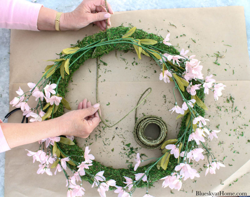 wrapping spring wreath with wired twine