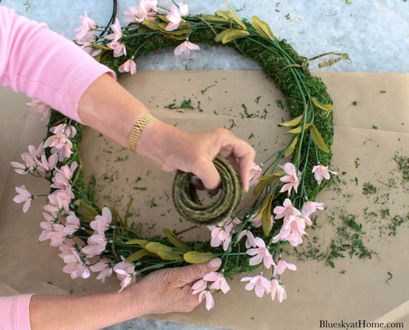 wrapping spring wreath with wired twine