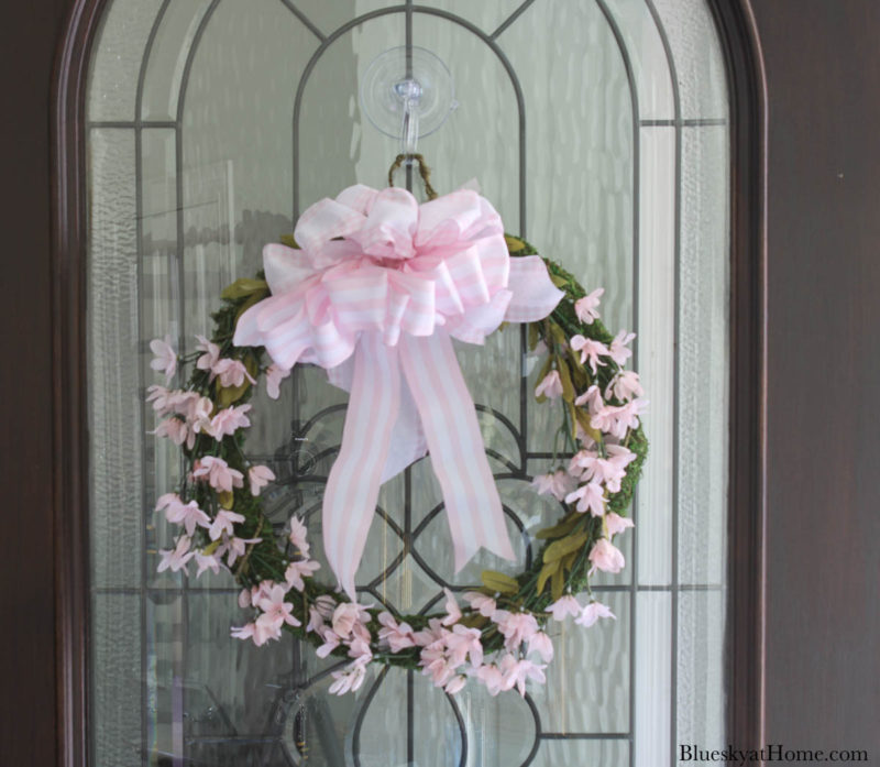 spring floral wreath on front door