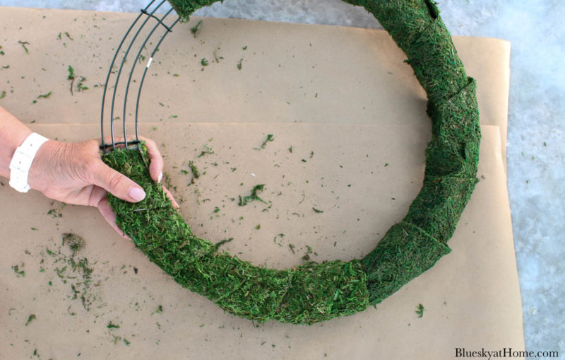 wired wreath covered in wired moss ribbon