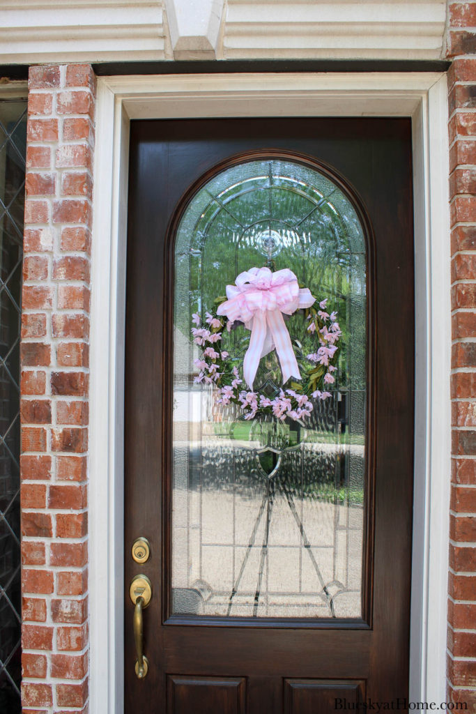 spring floral wreath on front door