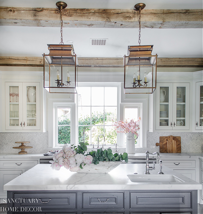 spring kitchen with island and pink flowers