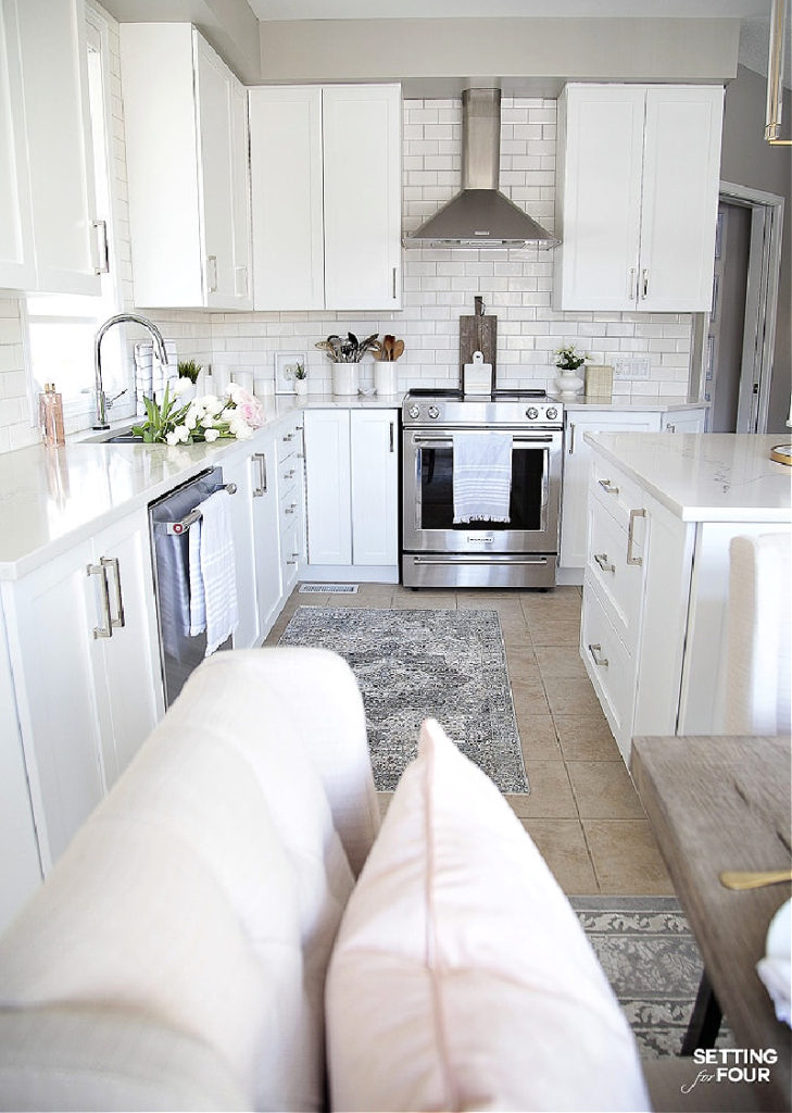 spring kitchen with rug and white counters