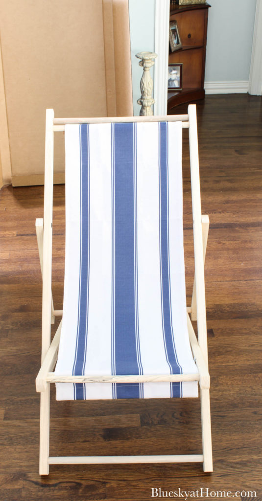 cabana chair with blue and white stripe fabric sling