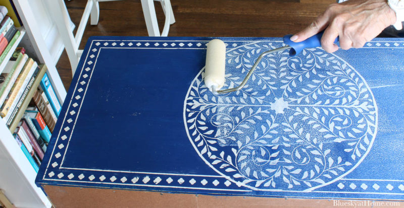 applying matte sealer to stencil