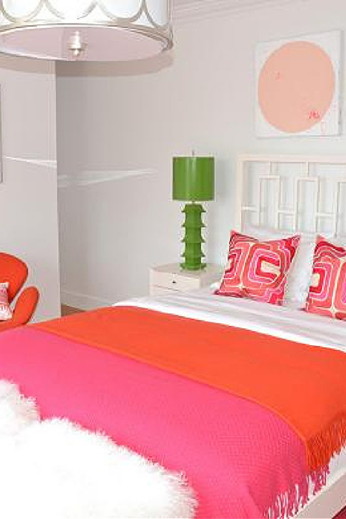 summer bedroom with bright pink HGTV bedding and green lamp