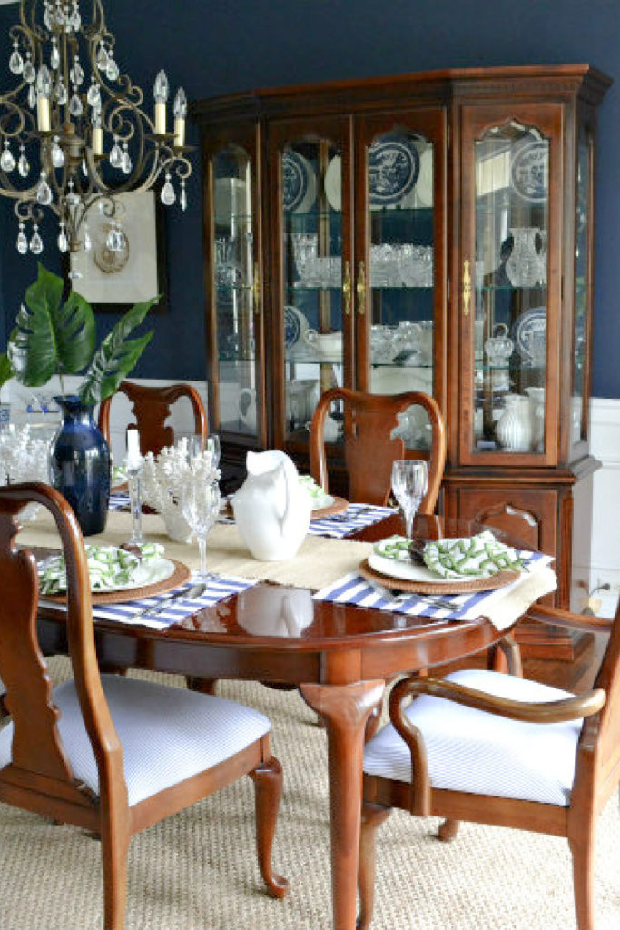 dining room with navy blue wall