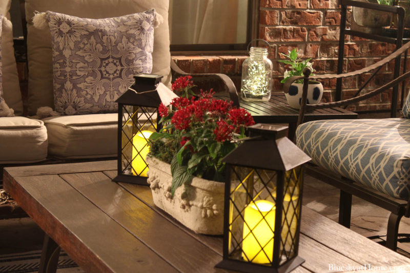patio lanterns with candles at night