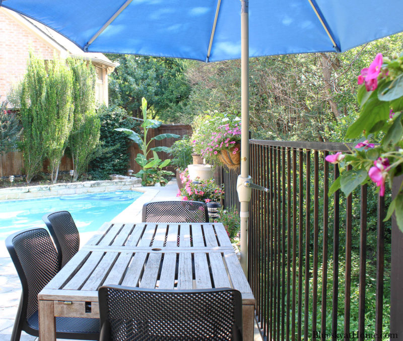 teak table on patio