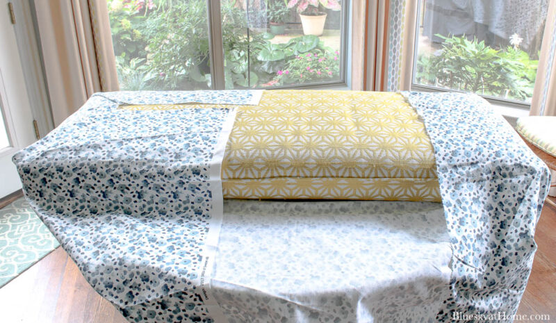 wrapping no~sew bench cushion with blue fabric