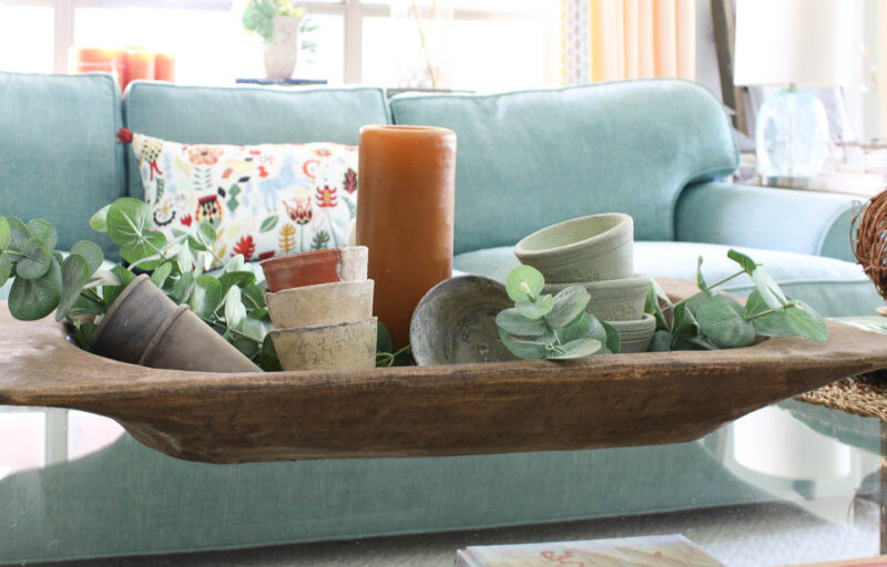 fall terra cotta pots in wood tray on coffee table