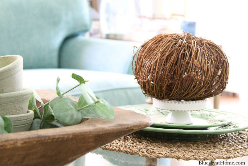 twig pumpkin on white stand