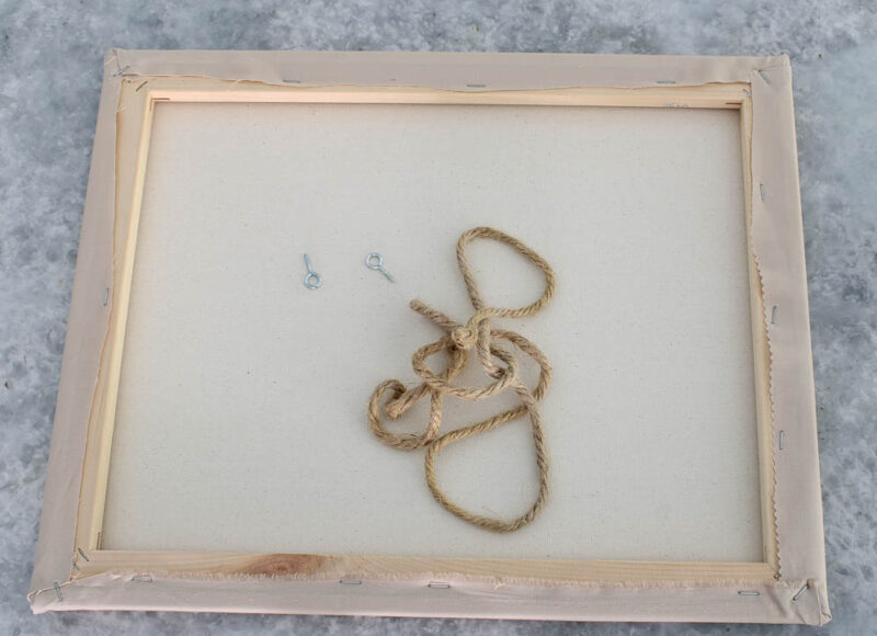 large canvas with hooks and jute twine