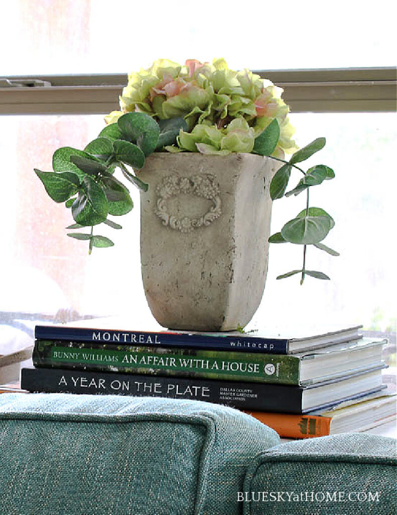 stone vase with greenery