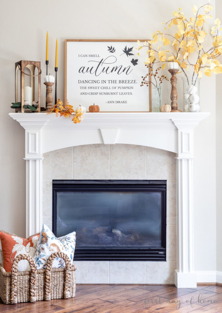 fall mantel with candlesticks and lantern