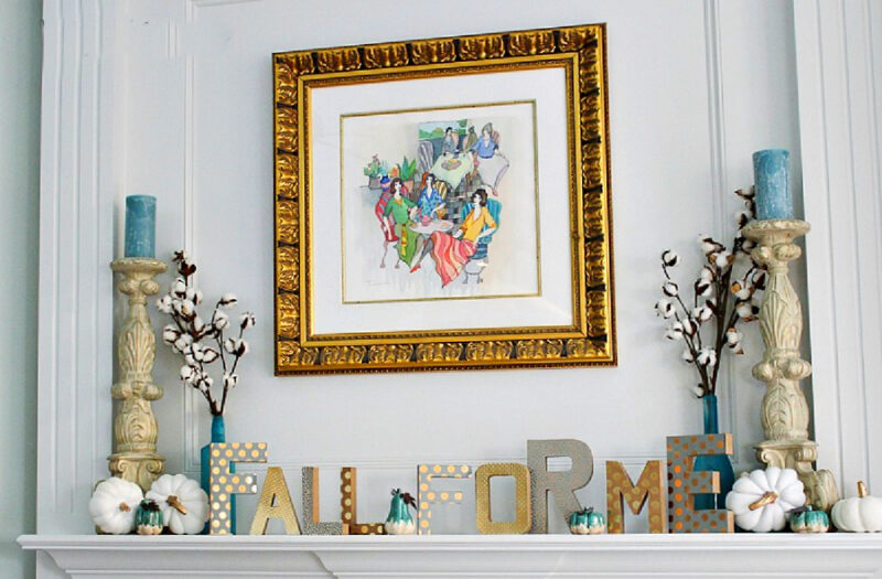 fall mantel with metallic paper covering cardboard letters on mantel