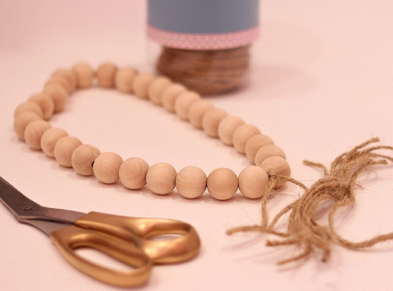 wooden beads tied with twine