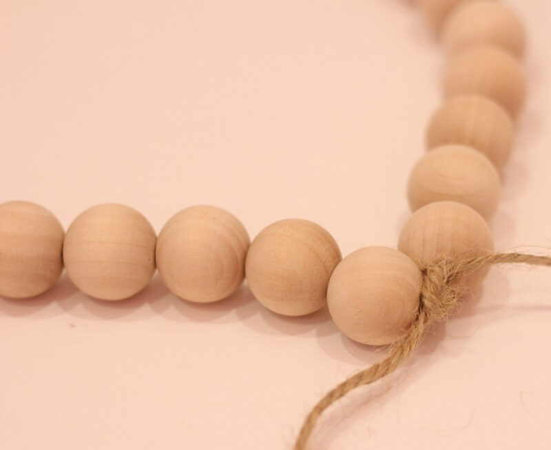wooden beads tied with twine