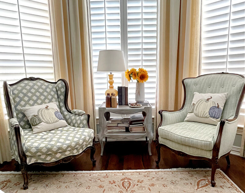 two wing chairs with fall accents