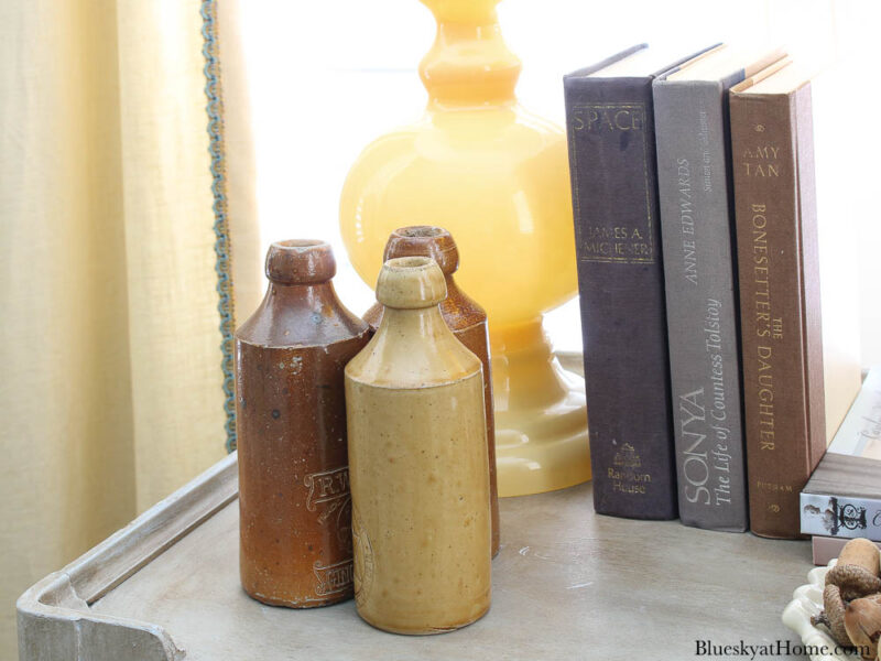 3 ceramic jars in gold and brown