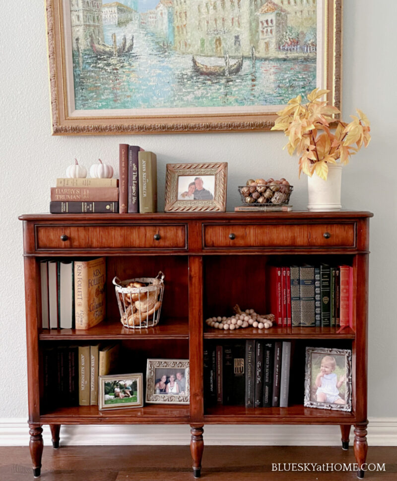 console table with fall accessories