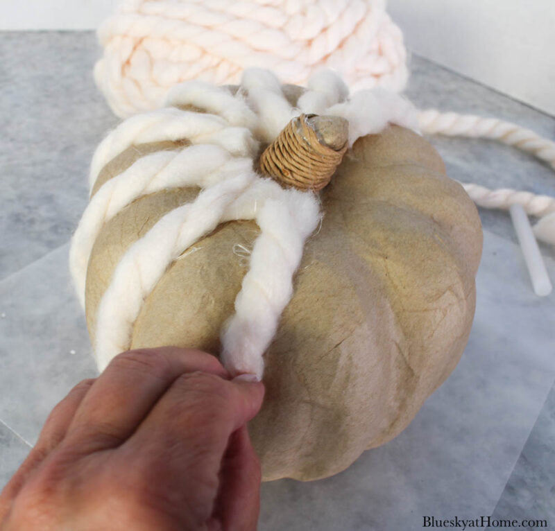 adding yarn to pumpkin