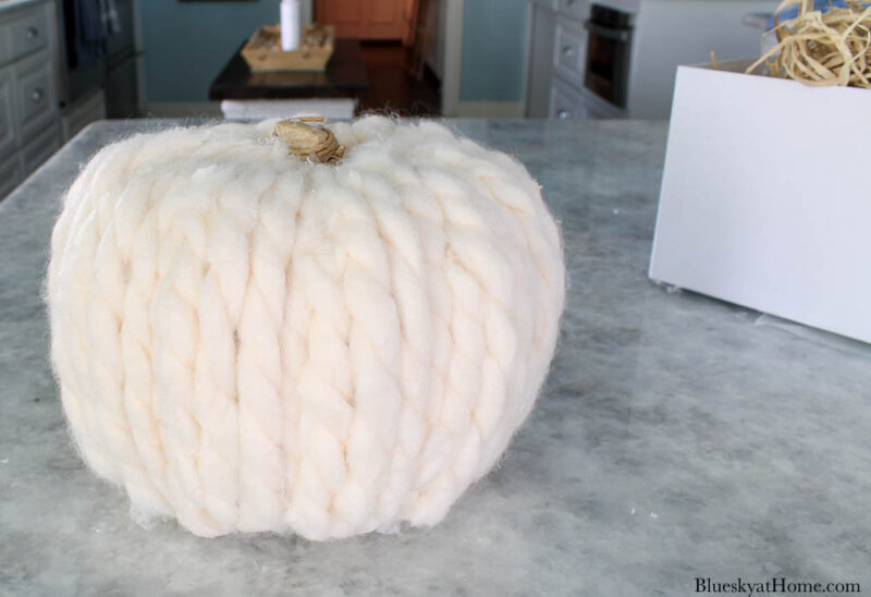 pumpkin with yarn