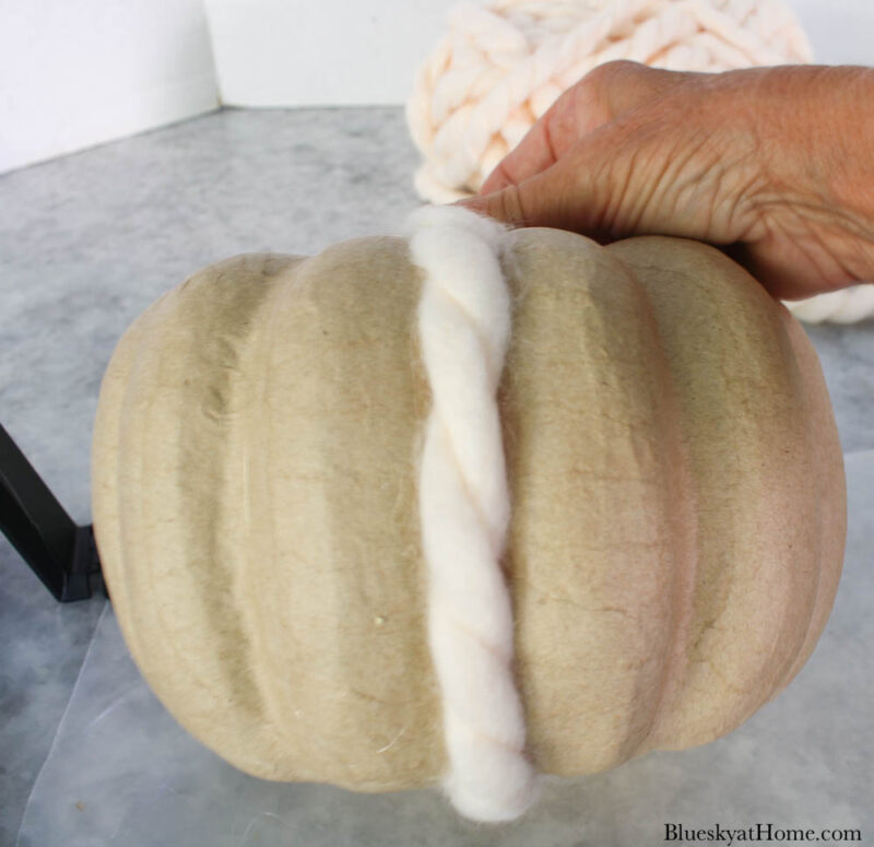 adding yarn to pumpkin