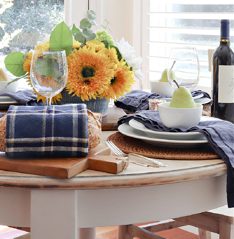 fall blue tablescape with sunflowers