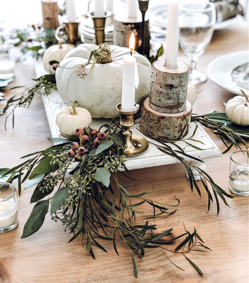 fall tablescape with white pumpkins and greenery