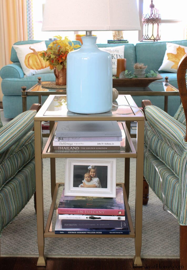 glass and metal end table with three shelves for living room update