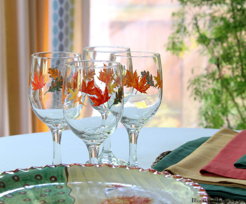 wine glasses with fall leaves