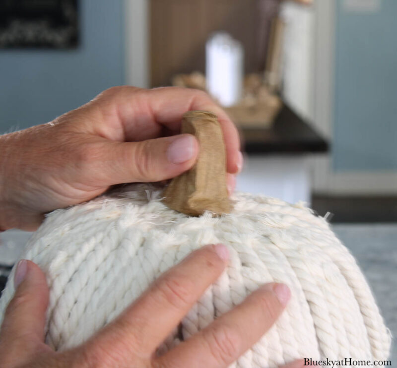 gluing stem on white rope pumpkin