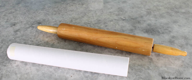 rolling pin and white cardboard tube