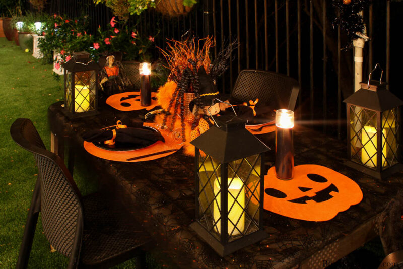 Halloween tablescape on the patio at night