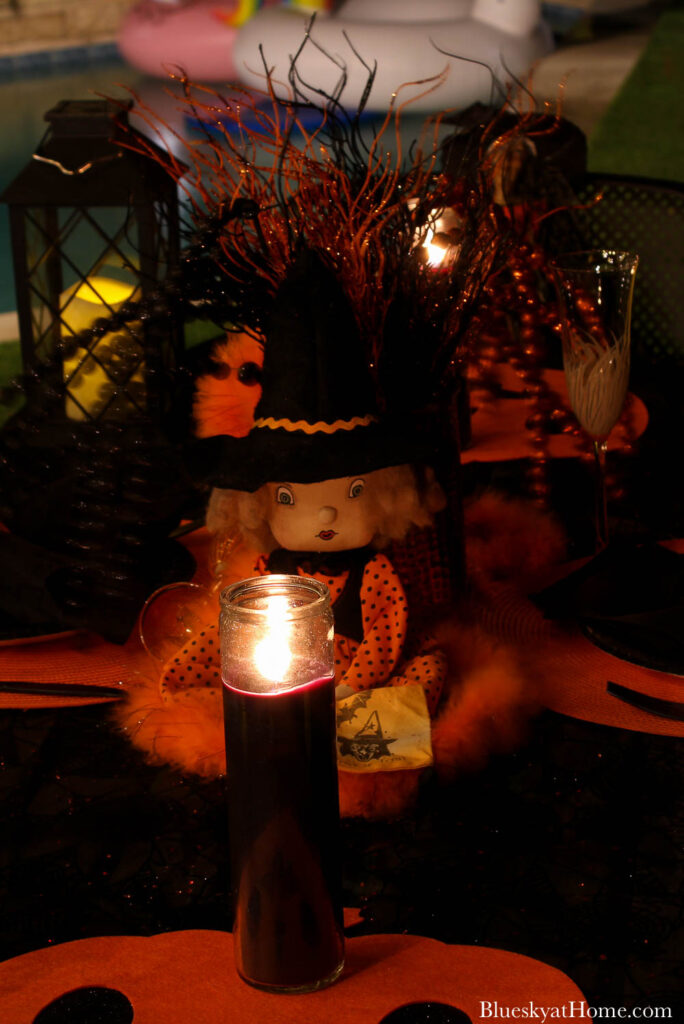 Halloween tablescape on the patio at night