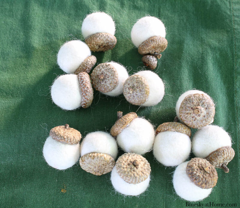 white felt balls with acorn tops