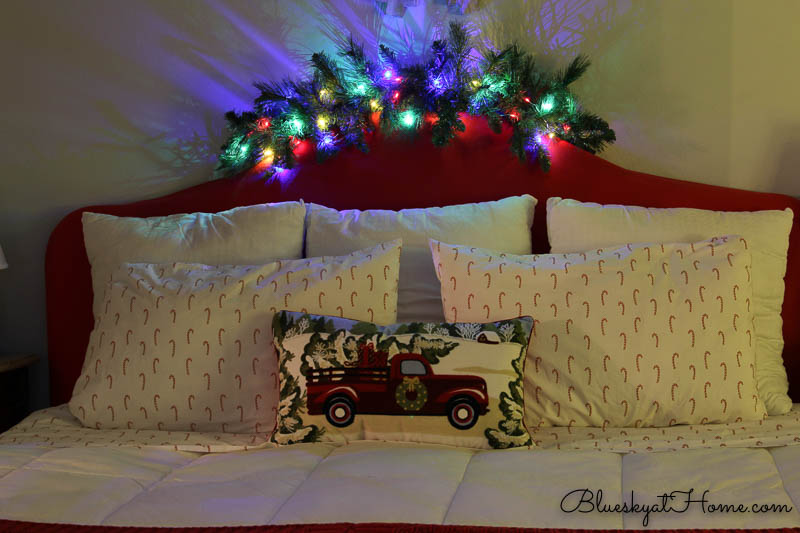 lighted garland on headboard