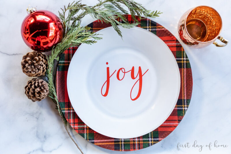 red plaid charger with white plate