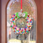 Christmas ornament wreath on door